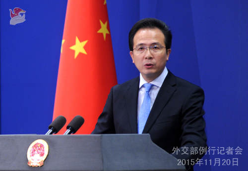 原文配圖:2015年11月20日外交部發(fā)言人洪磊主持例行記者會。